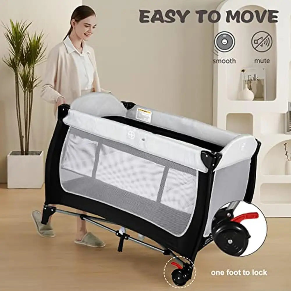 4-in-1 Portable Baby Nursery Playard with Bassinet Changing Table Playpen Travel-Friendly Design Spacious & Safe Structure
